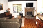 Mammoth Lakes Rental Sunshine Village 150 - upgraded living room with a flat screen TV and woodstove